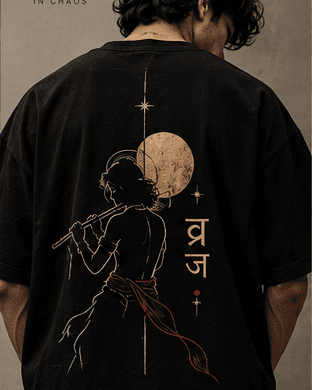 Back of the black VRAJ tee: Krishna with a flute beneath a full moon, drawn in fine gold line